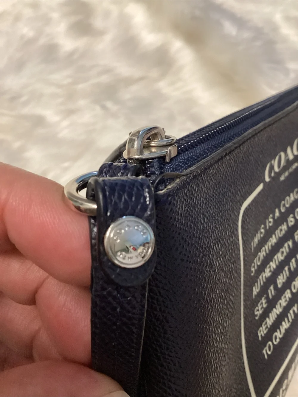 Coach Navy Wristlet with Cream Logo Text